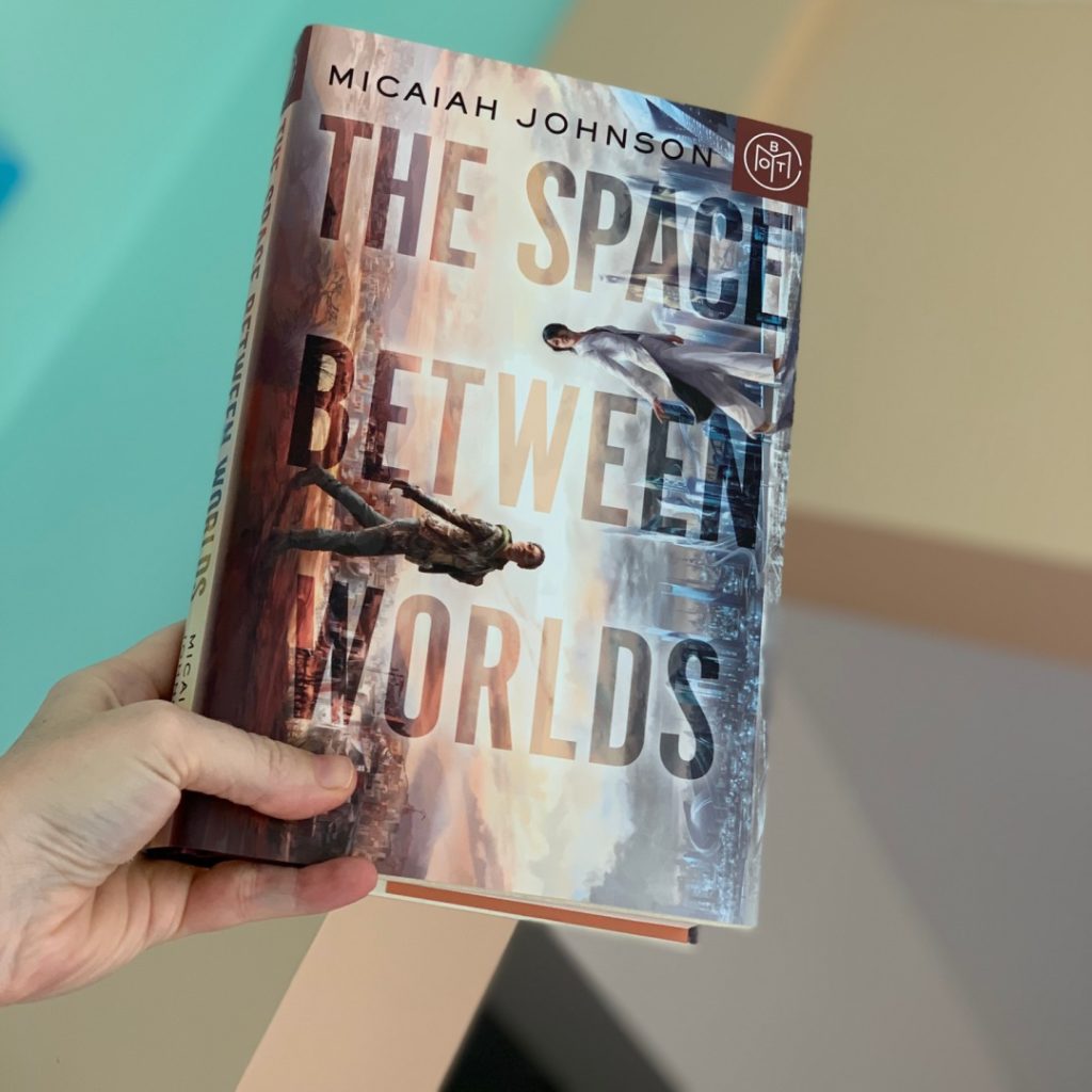 the space between worlds by Micaiah Johnson #bookreviews #brandisbookcorner #beingfibromom #thespacebetweenworlds #micaiahjohnson